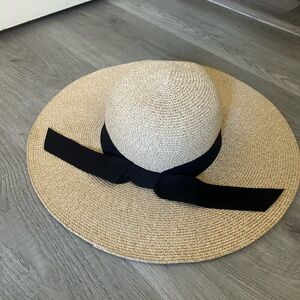 tan and black wide brim summer hat